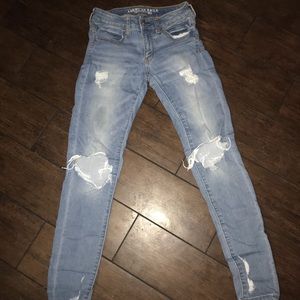 Distressed light wash jeans